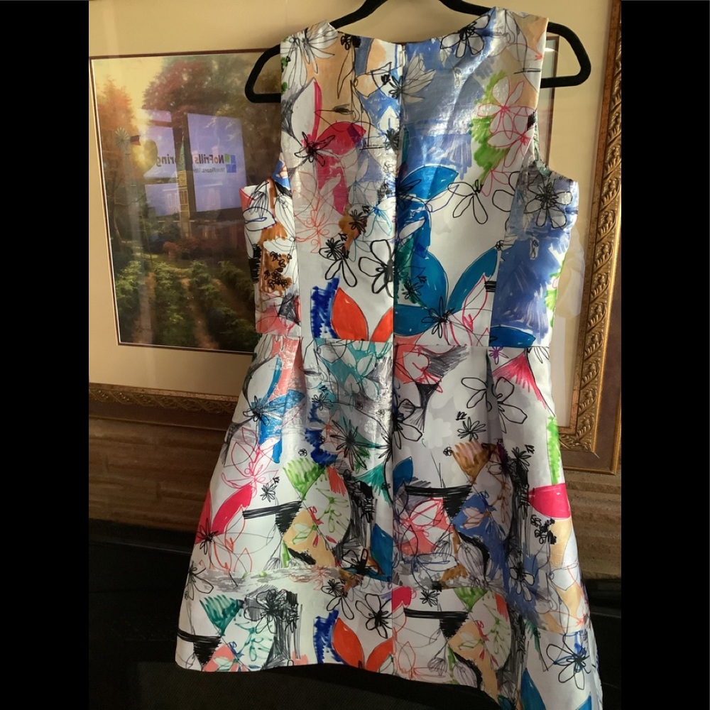 DRESS IN A GORGEOUS DON LANCASTER IT Says PARTY